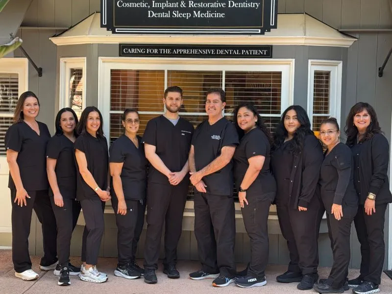 Image of the team in front of the clinic