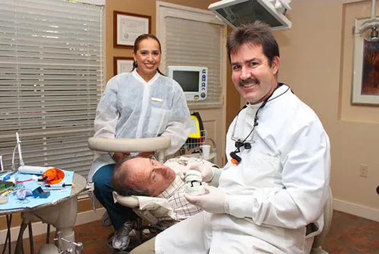 Image of the doctor, patient, and staff